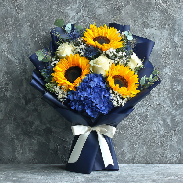 Oceanlight Sonata — Featuring Sunflowers & Blue Hydrangeas